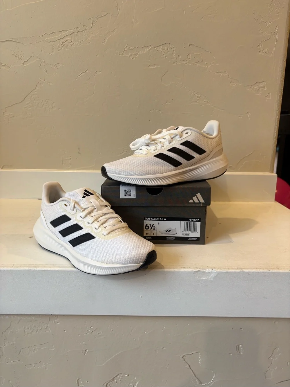 Adidas Women’s White Sneakers with Black Stripes